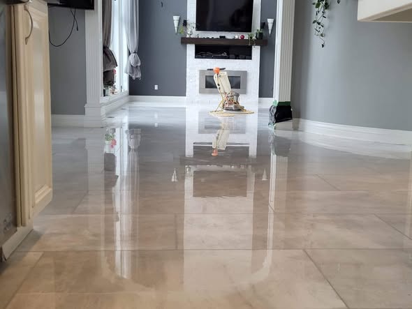 Mirror-finish Italian repolish completed on marble floor